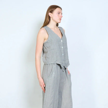 Gilet smanicato con scollo a V e bottoni frontali