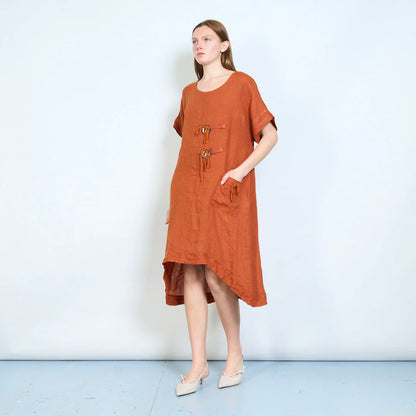 Abito donna ampio con laccetti decorativi e tasca