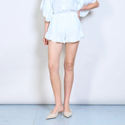 Shorts donna in lino con balza e vita elasticizzata